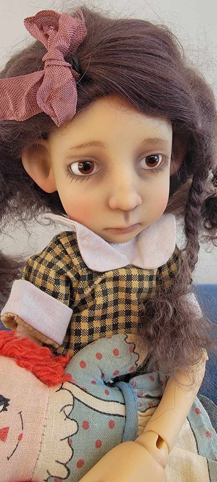 7.5" mohair styled with braids