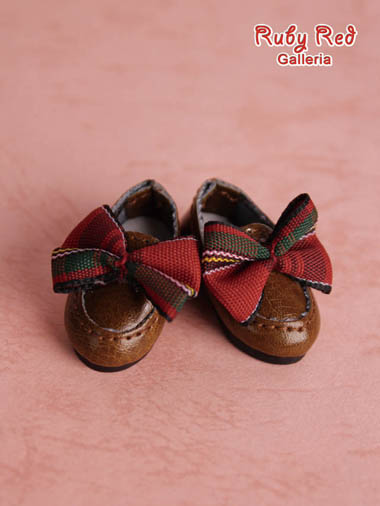 Brown slip on with Bow